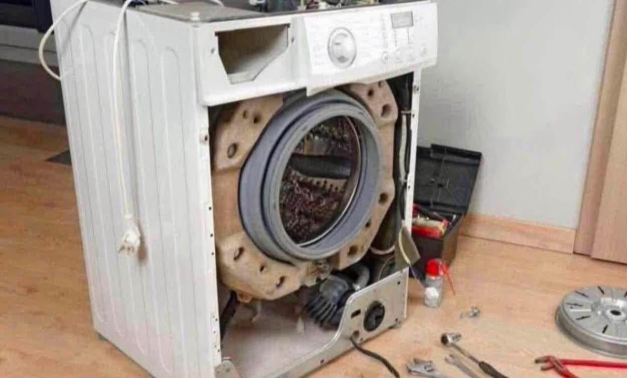 Washing machine stripped down mid-repair